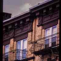          Color slide of detail view of cornices, friezes, dentils and fire escapes on two buildings on the E side of Willow between 12th and 13th picture number 1
   