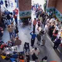 Color photo of party in Hoboken Historical Museum walkway celebrating the publication of Tom Olivieri oral history chapbook, May, 2005.