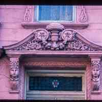          Color slide of close-up view of portico pediment, brackets and stained glass transom window at 161 12th between Bloomfield and Garden picture number 1
   