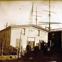 B+W photo of the first Atlantic Boat Club house at the foot of 4th St. and the Hudson River, 1887.