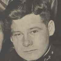          detail man second row in uniform
   
