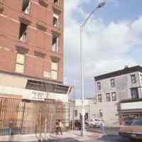 Color slide of buildings under renovation on or near First and Clinton Sts., Hoboken, ca. 1983-84.