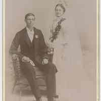 Cabinet photo: wedding portrait of Axel & Emma Jacobson in Dimmers Photo Studio, Hoboken, n.d., ca. 1892-1899.