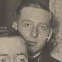          detail man standing; in uniform
   