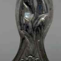          detail maker's mark: Alvin Manufacturing Co. (eagle left; anchor right)
   