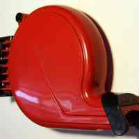 Turn-O-Matic brand ticket dispenser used for customer service at Apicella