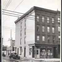 B&W photo of mixed-use apartment building at 700 Willow Avenue, Hoboken.