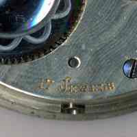          detail back, right side (rotated): 17 Jewels; note side winding stem hole
   
