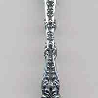 Souvenir spoon: Hoboken, N.J. Engraved depiction of marsh with mosquito. Circa 1921.