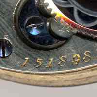          detail back, top: movement serial number: 1518983
   