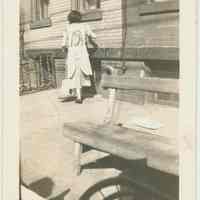          B+W photo of a Mrs. McNamara on street in front of building, location not known, Hoboken, September, 1937. picture number 1
   