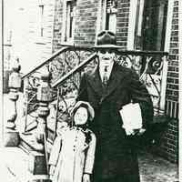 Black-and-white photocopy of photo of Joe Apone and daughter standing in front of 721 Adams St., Hoboken, 1942.