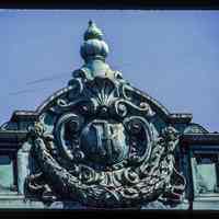 Color slide of close-up view of pediment reading "JK" at 929 Washington between 9th and 10th