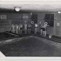 B+W photos, 2, of swimming pool class at Hoboken Y.M.C.A., Hoboken, n.d., ca. 1940s.