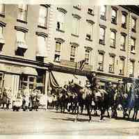 Digital image of sepia-tone photo of a Washington Street parade with a mounted unit near Eighth Street, Hoboken, no date, ca. 1920-25.