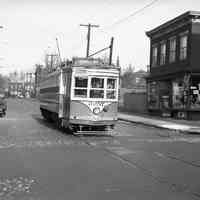 B+W photo negative of PSCT streetcar 3257 inbound to Hudson Pl. Terminal (Hoboken); Jersey City?, n.d., ca. 1946?