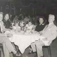 Digital image of black-and-white photo of birthday dinner for John & Leonore Muller at Tavern on the Green, Central Park, New York, August 19, 1952.