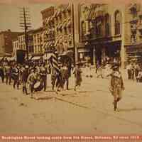 Photo of a parade on Washington Street looking south from Fifth to Fourth Sts., Hoboken, ca. 1913.