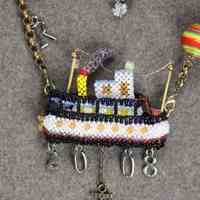          detail of the beaded ship, the ferry 