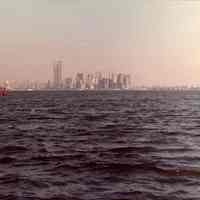 Digital scan of color photo of lower Manhattan from the southeast, no date, circa 1970-1980.