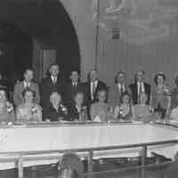 B+W group photo of unidentified people at a banquet, location not identified, no date, ca. 1950.