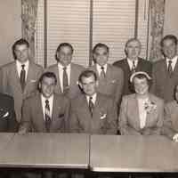 Digital image of b+w photo of Mayor Fred DeSapio with his ticket for the 1953 City elections, Union Club, March 24, 1953.