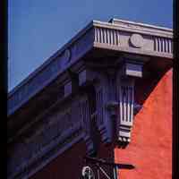          Color slide of detail view of cornice, brackets, frieze and fire escape at 155 6th between Bloomfield and Garden picture number 1
   