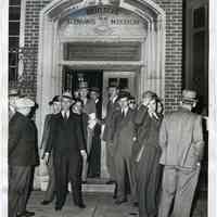 B+W photo of immigration agents raiding the German Seaman