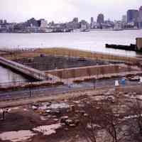 Color photo of an elevated view of construction progress of Pier A Park, Hoboken, 1999.