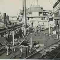 B+W photo showing damage on the main deck on unidentified vessel at the Bethlehem Steel Shipyard, Hoboken Division, no date, ca. 1940.