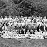 Sepia-tone group photo of the Annual Outing of the Hoboken, N.J. Postal Employees, Bellevidere (sic) Farms, Pearl River, N.J., June 22, 1930.