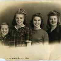 Sepia-tone group portrait of 4 Stover family daughters of 1037 Bloomfield St., Hoboken, Christmas 1943.