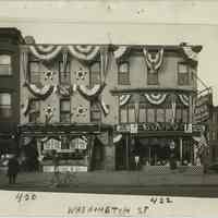 B+W photo of 420 & 422 Washington Street decorated with bunting and swagging by United Decorating Company of Hoboken, Hoboken, n.d., ca. mid-Oct. 1933.