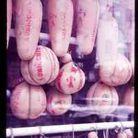 Color slide of Italian cheese in a window.