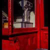          Color slide of detail view of storefront window at 1001 Bloomfield picture number 1
   