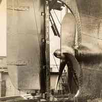 Image: profile view of the rudder and propeller of an unidentified vessel in dry dock, no place, no date, ca. 1932-39.
