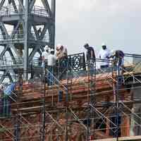          18: workers on the eastern facade of ferry portion of terminal
   