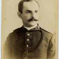 Cabinet photo of man with mustache in military uniform, no date, circa 1885-1890.