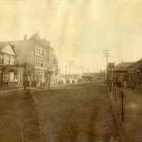 Sepia-tone photo of view on Fourteenth Street to the ferry terminal, Hoboken, no date, ca. 1890.