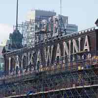          19: sign, scaffolding on eastern facade, ferry portion of terminal
   