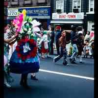 Color slide of people walking in a parade.