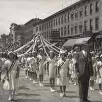 Digital image of B+W negative image of a Hoboken Playgrounds girls marching unit on Washington St., Hoboken, no date, circa 1938-1940.