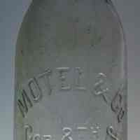 Bottle: Motel & Co., Cor. of 8th & Garden Sts., Hoboken, N.J. No date, circa 1910-1920.