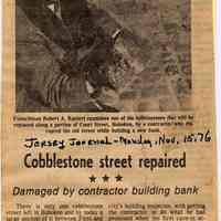 Digital images of newsclipping: Cobblestone Street Repaired; Damaged by contractor building bank. Jersey Journal, Nov. 15, 1976.