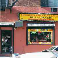 Color photo of a wall sign for Hoboken Discount Liquor, 98 Willow Avenue, Hoboken, Jan. 3 & 4, 2002.