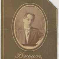 Sepia-tone photo of an unidentified boy posed in studio, Hoboken, no date, ca. 1890-1910.