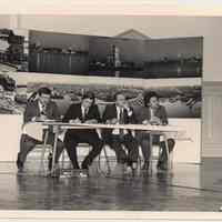 B+W photo of a four-man panel at a waterfront development meeting, Hoboken, n.d, ca. 1983-1988.