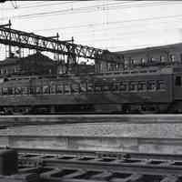 B+W photo negative of Delaware, Lackawanna & Western R.R. passenger car, MU 2506, in train yard, Hoboken, n.d., ca. early 1930s.