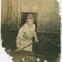          photo 2: Michael Riccio in World War II Army uniform while playing pool
   