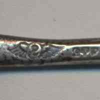          maker's mark and sterling mark
   